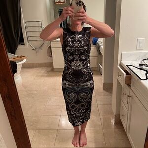 Beautiful Ted Baker dress. Size one. Like new without tags.